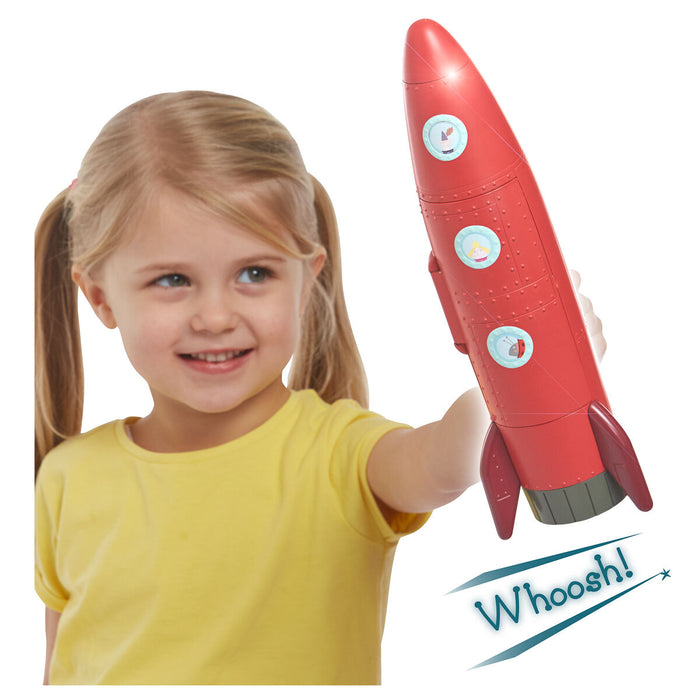Young girl holding Ben & Holly's Elf red rocket 
