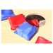 Red and blue bean bags in shooting hole