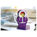 Eskimo playing figurine with purple coat on 